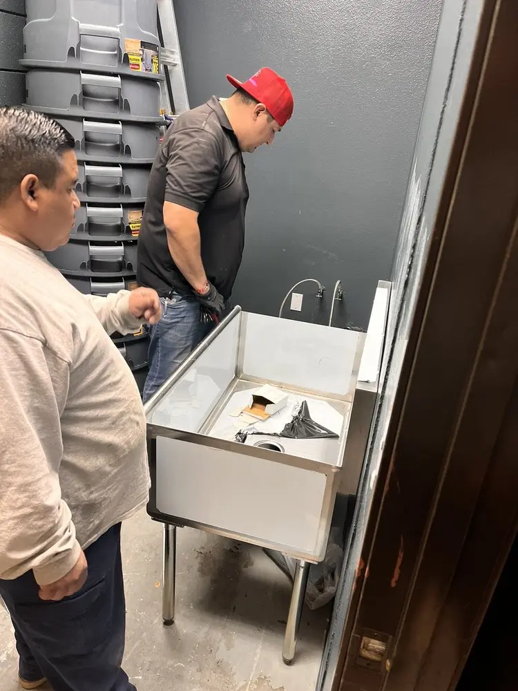 Commercial plumbing and sink installation in Aubrey